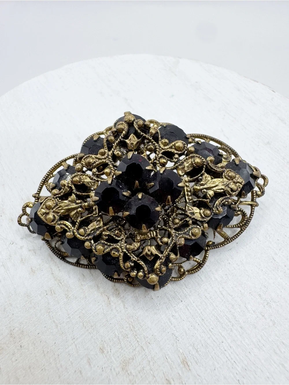 Antiqued gold tone filigree Czech style glass brooch pin